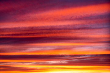 Fototapeta premium Dramatic sunset and sunrise sky. Fiery orange sunset sky.