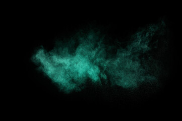 Aquamarine powder explosion on black background. Colored powder cloud. Colorful dust explode. Paint  Holi.