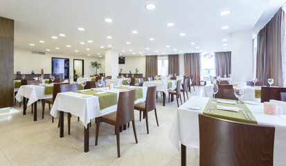Interior of modern urban restaurant in sunlight