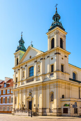 Fototapeta na wymiar Facade of Pauline Order Church of Holy Spirit - kosciol sw. ducha - at Freta street in historic New Town quarter of Warsaw, Poland
