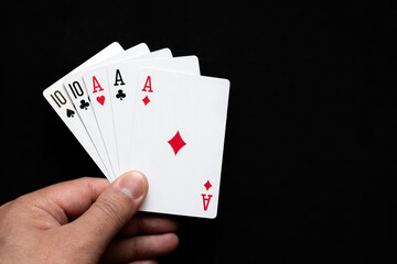 Full house combination in poker on black background. Poker  combinations concept.
