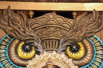 Eagle bird pattern behind Lord Ganesha.