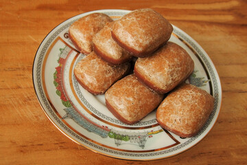 Stack of delicious German Brown Gingerbread biscuits with chocolate bottom, a traditional Christmas and New Year's Eve holiday treat