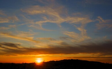 Picturesque landscape of cloudy sky and sunset