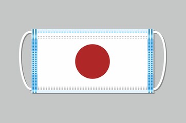Medical mask with Japan flag on it. Flat design on a gray background. Vector face mask