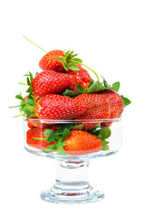 Group of fresh strawberries in the transparent vase