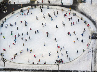 An aerial view of a skating rink with lots of skaters, Warsaw, Poland