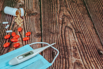 A Lot Of Different Drugs, Pills And Other Medicine On The Wooden Table