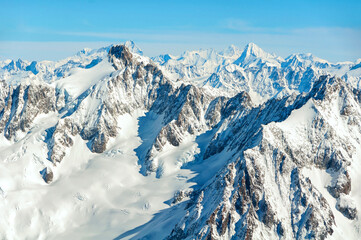 Fototapeta na wymiar Aerial view of Chamonix valley mountains Montblanc in France in winter