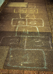 Hopscotch on pavement drawn with chalk