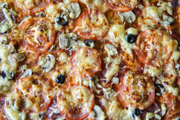 delicious fresh Italian pizza just from the oven.  top view