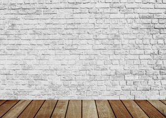 White brick wall  over plank wooden  background.  can be used for montage or display your products