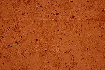 Brown background. Old wall. Concrete wall texture covered with brown stucco.