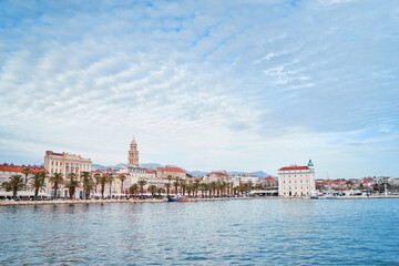 Fototapeta na wymiar Travel by Croatia. Beautiful landscape with Split Old Town on sea promenade.