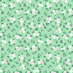 Elegant floral pattern in small pale pink and white flowers. Liberty style. Floral seamless background for fashion prints. Ditsy print. Seamless vector texture. Spring bouquet.