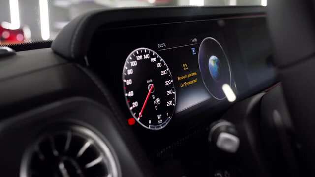 Luxury Car Dashboard, Electronical Speedometer. High Tech Control Panel. Close-up