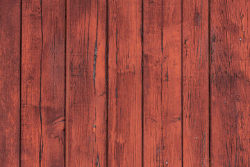 Obraz premium Fragment of an old painted wooden wall. Background, texture, boards