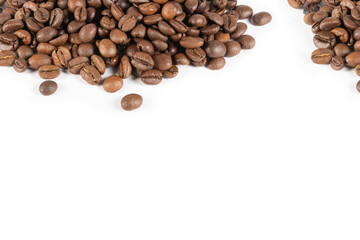 Roasted coffee beans on a white background. Place for text.