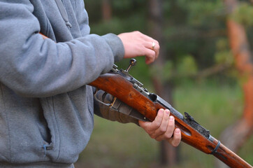 Unformal shooting range near Kiev. Vintage Soviet rifle . Kiev Region, Ukraine