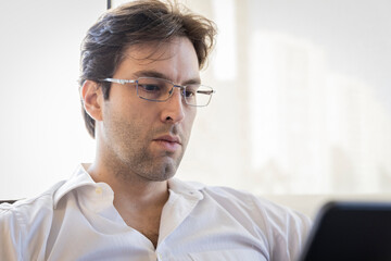 man working from home. Making a conference call.