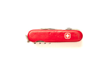 Swiss knife isolated on white background when folded