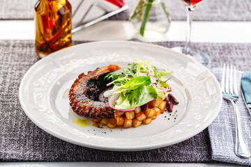 Close up of cooked octopus in a restaurant serving