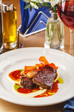 Beef Tenderloin Medallions With Sauce And Onion