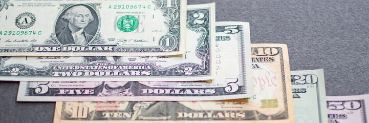 background with american dollar bills with different values