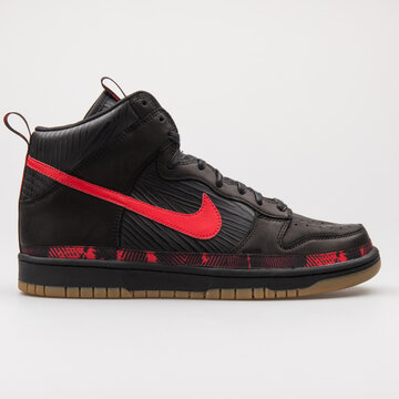 VIENNA, AUSTRIA - AUGUST 24, 2017: Nike Dunk High Premium N7 black and red sneaker on white background.