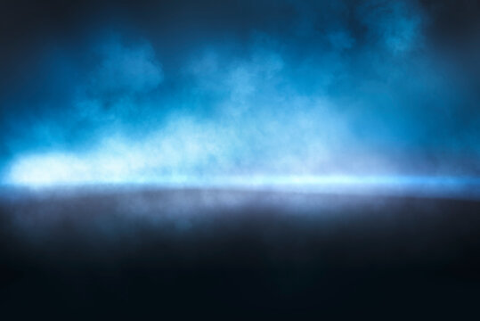 Abstract blue mist studio background.