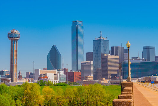 Traffic on a Bridge leads to Dallas skyline in downtown Texas. 