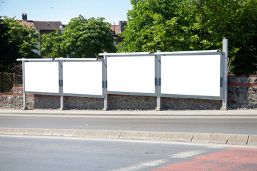 advertising board on asphalt road