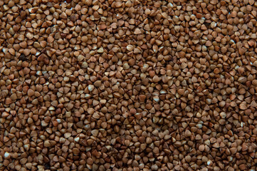 Buckwheat seeds as food background. Top view.