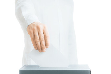 Unrecognizable man putting a ballot into a voting box, elections.