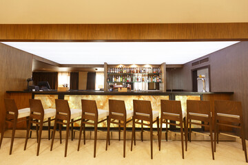 Bar for guests to hotel, with wooden walls