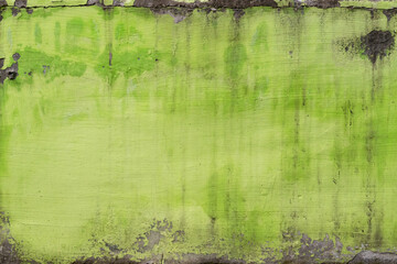 Texture of fresh green paint on concrete