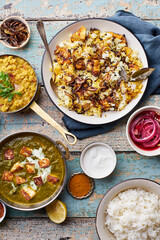 Indian cuisine dinner: tandoori chicken, biryani