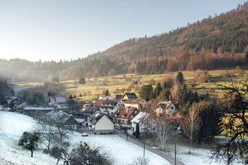 Fototapeta na wymiar Winter view of village in a valley of Schwarzwald (Black forest Germany)