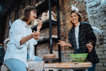 Making a handmade clay pot. Pottery lesson, hobby.