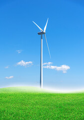 Fototapeta premium Wind farm in the field. Wind power station in a glass against a blue sky.