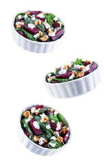 Spinach beet goat cheese walnuts salad on a white isolated background
