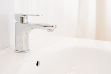 New modern bathroom. Water tap. Faucet. 