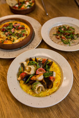 risotto with seafood in a restaurant on the table