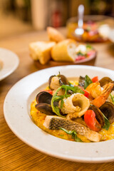 risotto with seafood in a restaurant on the table