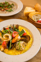 risotto with seafood in a restaurant on the table