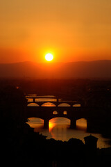 Sunset on the river Arno bridge in Florence, Tuscany of Italy