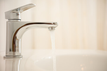 New modern bathroom. Water tap. Faucet. 