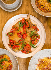 italian food, pasta, tomatoes, pizza, collage on the table