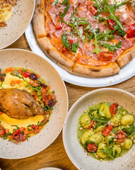 italian food, pasta, tomatoes, pizza, collage on the table