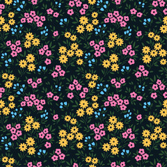 Cute floral pattern in the small flower. Ditsy print. Seamless vector texture. Elegant template for fashion prints. Printing with small pink and yellow flowers. Dark blue background.